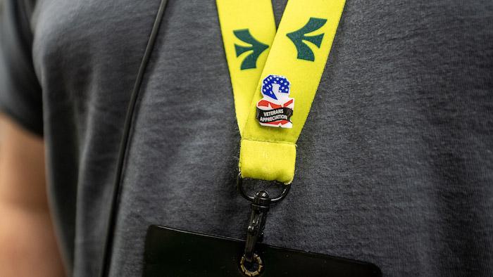 DSG Employee wearing a Veteran's Appreciation pin on his name badge. 