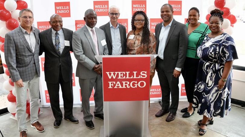 With $6.8 million in grant funding from Wells Fargo and the Wells Fargo Foundation, seven nonprofits will expand their work in housing and small business growth. Pictured right to Left: Darlene Goins, Wells Fargo Foundation; Elizabeth Wattley, Forest Forward; Dallas Mayor Eric L. Johnson, Alexis Snow, Wells Fargo; Wells Fargo Chairman and CEO Charlie Scharf; Dr. Terry Flowers, St. Philips School and Community Center; Pastor Chris Simmons, Cornerstone CDC; and Scott Fontenot, Wells Fargo. With $6.8 million in grant funding from Wells Fargo and the Wells Fargo Foundation, seven nonprofits will expand their work in housing and small business growth. Pictured right to Left: Darlene Goins, Wells Fargo Foundation; Elizabeth Wattley, Forest Forward; Dallas Mayor Eric L. Johnson, Alexis Snow, Wells Fargo; Wells Fargo Chairman and CEO Charlie Scharf; Dr. Terry Flowers, St. Philips School and Community Center; Pastor Chris Simmons, Cornerstone CDC; and Scott Fontenot, Wells Fargo.