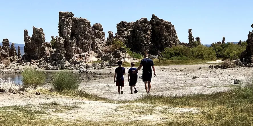 David Brabham walking outside with family 