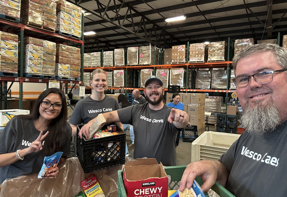 Wesco volunteers packing food donations.