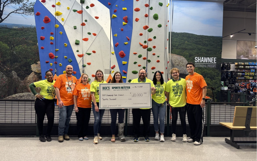 Team shown with the $20,000 grant check.