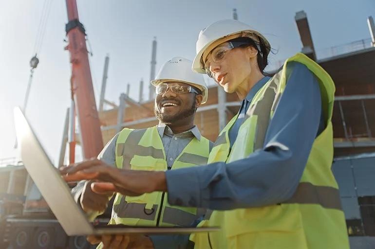 Two workers in hardhats