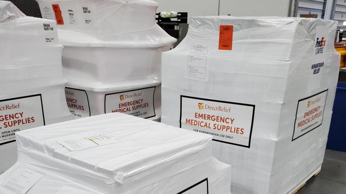 Stacks of wrapped pallets, "DirectRelief Emergency Medical Supplies" on the sides