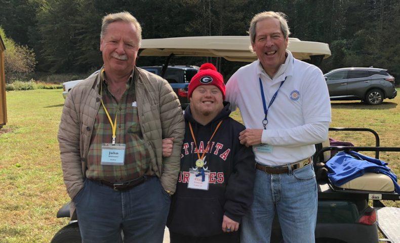 Photo shows (from left to right) Domtar CEO John D. Williams, Camp Blue Skies Camper Clay Conrad and Camp Blue Skies Founder Dick Sesler.