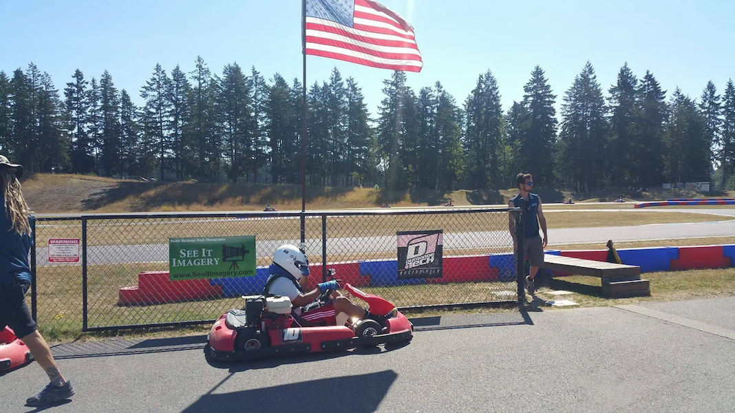 Dwayne driving an F1 gocart.