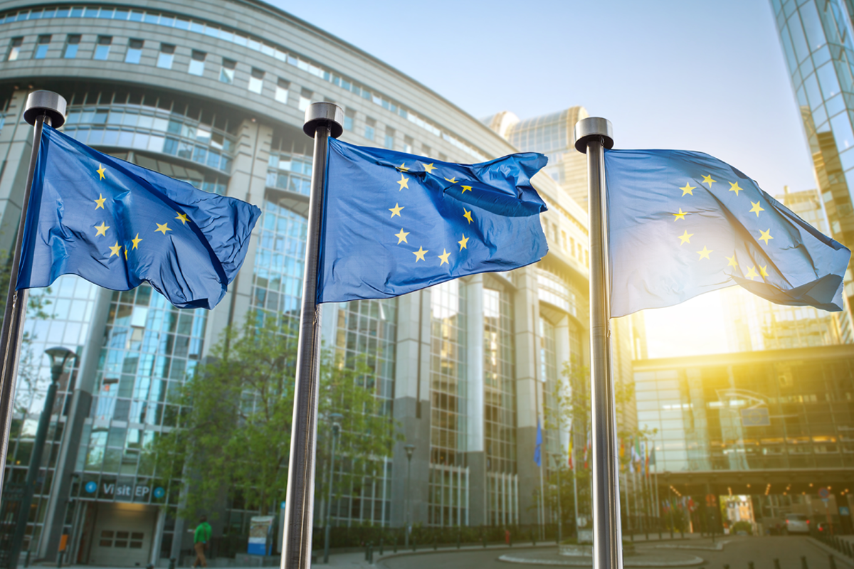 Three EU flags waving in the wind