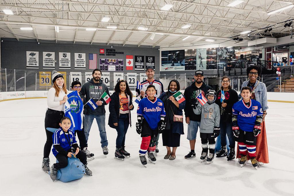 Al Montoya poses with youth from 24 Degrees of Color. Photo credit: Jason C Williams Photography