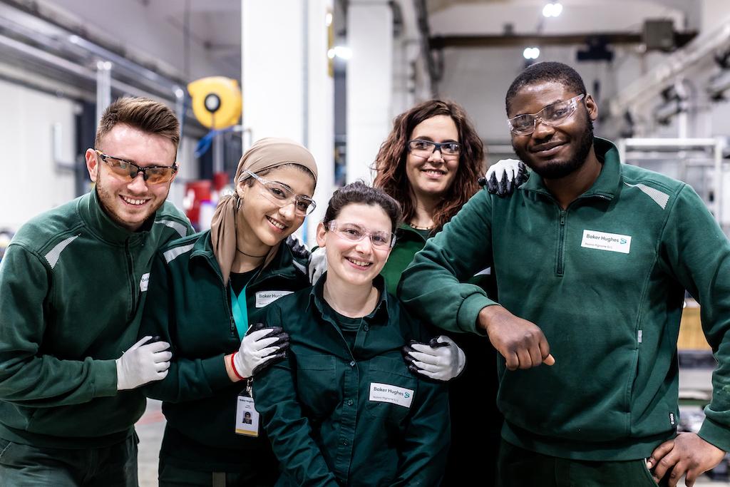 Photo Credit: Baker Hughes group of Baker Hughes employees posing together
