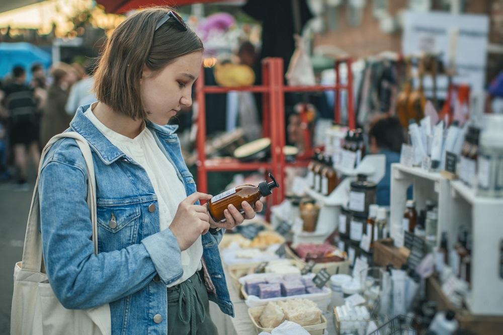 Woman Reading Label on Product