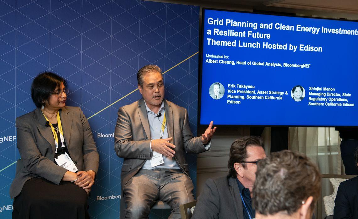 SCE executives Erik Takayesu (speaking) and Shinjini Menon explained the company's plans for transitioning to carbon-free energy sources at the BloombergNEF Summit in New York. SCE executives Erik Takayesu (speaking) and Shinjini Menon explained the company's plans for transitioning to carbon-free energy sources at the BloombergNEF Summit in New York.