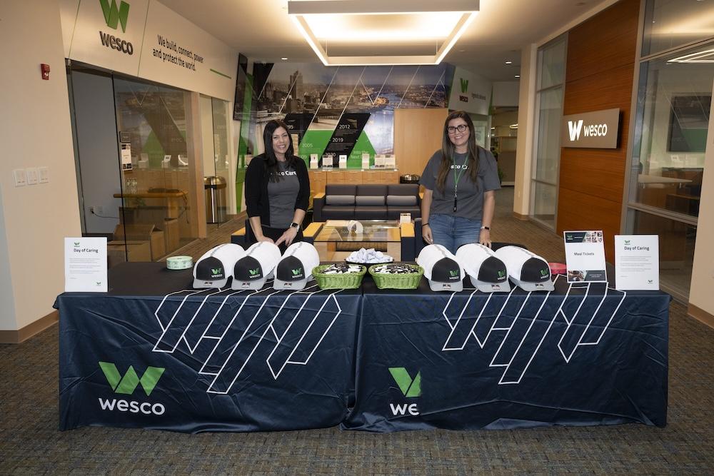 Wesco employees green new hires.