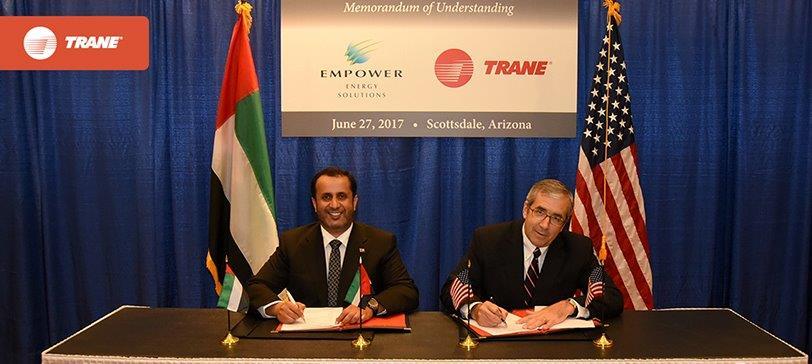 Empower CEO Ahmad Bin Shafar (left) and Dave Regnery, Trane Commercial president for North America, Europe, Middle East and Africa at the signing ceremony.