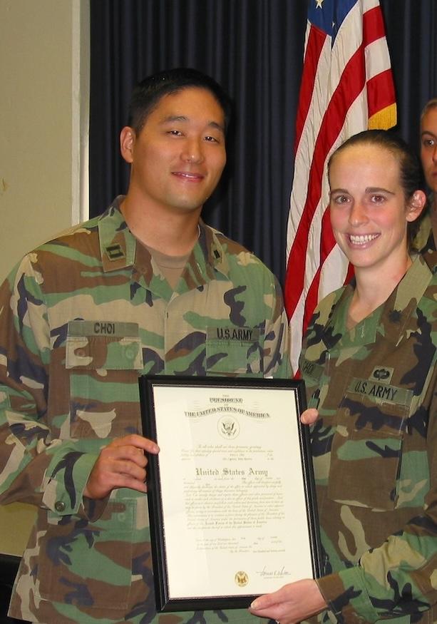 Erica Choi shown being promoted to the rank of Captain in the US Army.