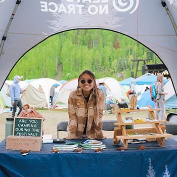 A person leant on an event table 