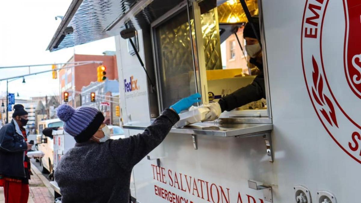 people getting food from food truck