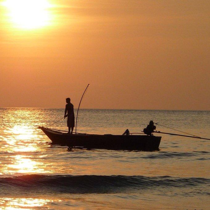 Fishing boat in the sunset