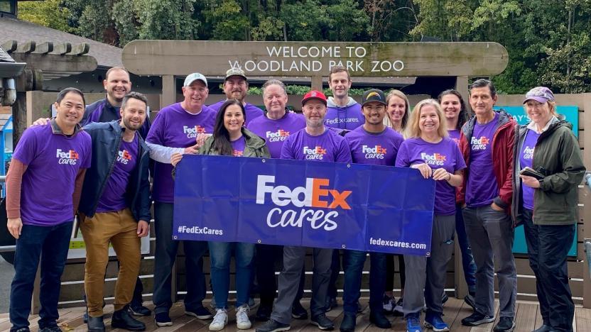 FedEx team members stood outside the Woodland Park Zoo 