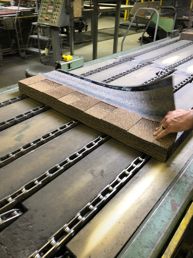 GAF asphalt shingles manufactured with recycled material from post-consumer waste shingles