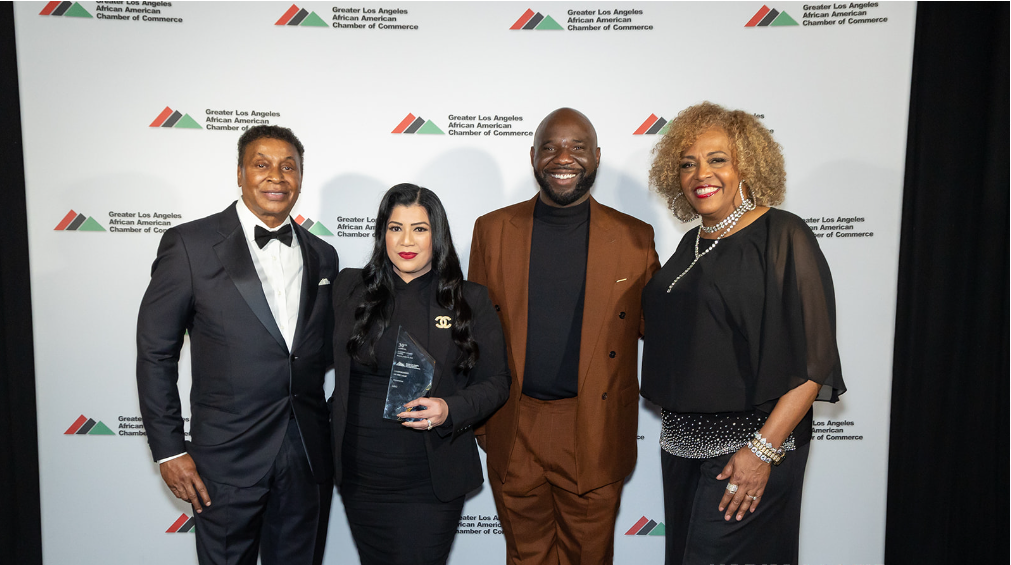 Gene Hale (Chairman, GLAAACC), Cameron Onumah (Head of Southern California Policy, GLAAACC) and Angela Gibson Shaw (President, GLAAACC) pose with Christina Tulfo (Supplier Diversity Manager, AEG).
