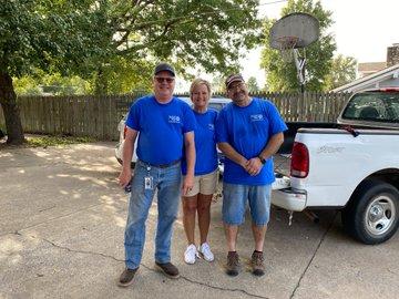 3 GP volunteers smile together for a picture