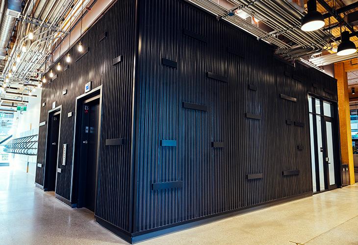 Gen2® elevator bank within a timber hoistway