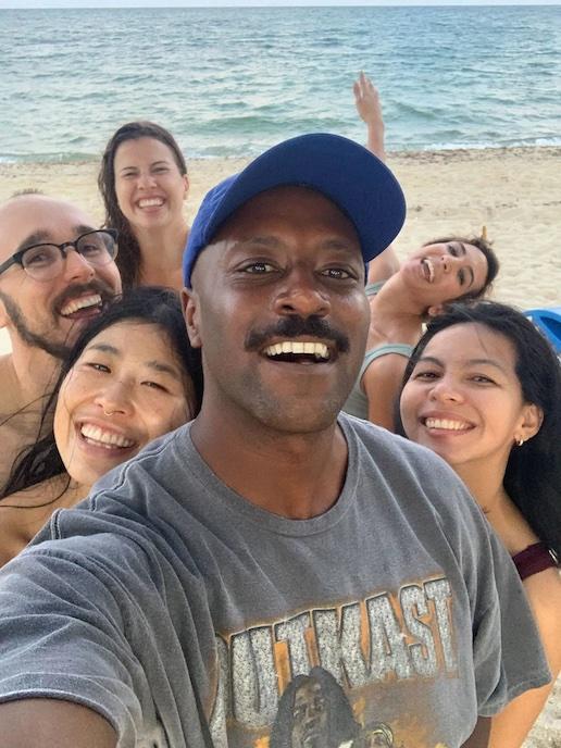 Geoffrey Brown at the beach with friends.