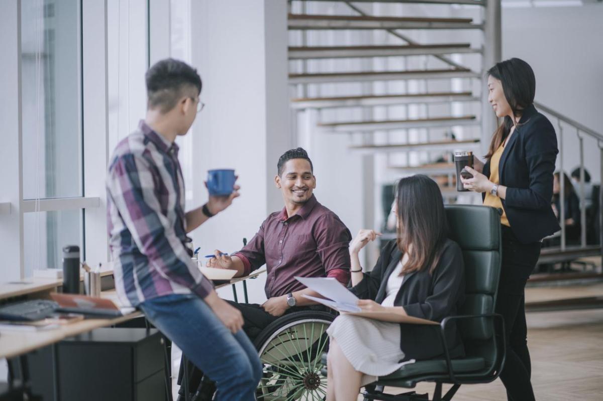 employees talking over coffee