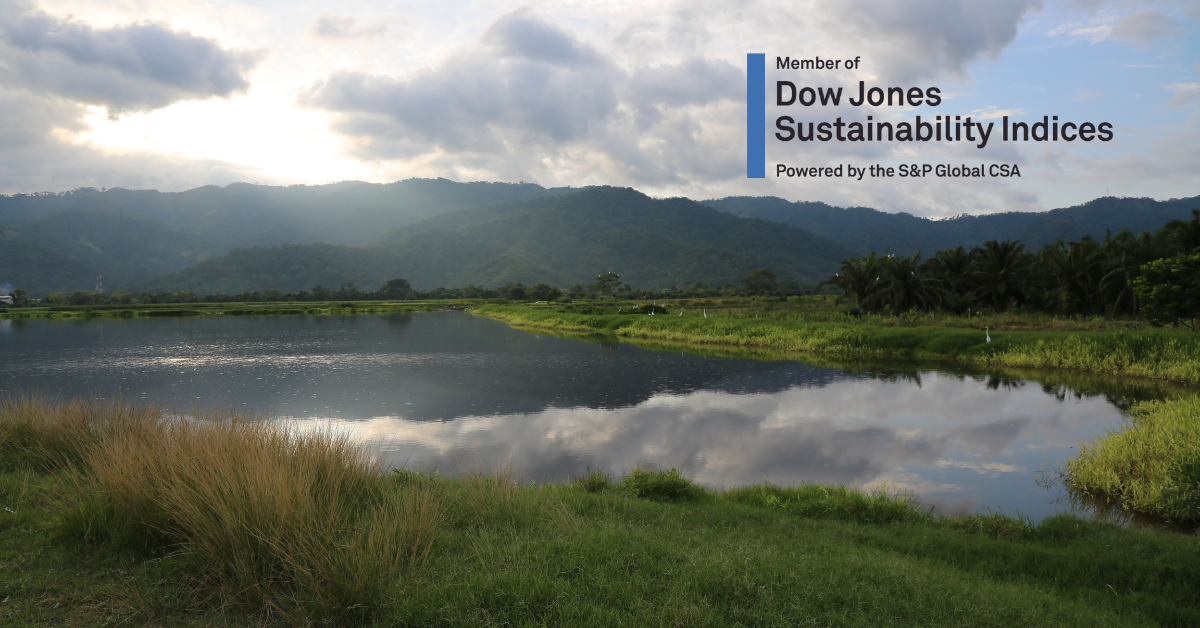 Gildan Included on the Dow Jones Sustainability™ Index for the 11th Consecutive Year "Member of Dow Jones Sustainability Indices Powered by the S&P Global CSA" text on a backdrop of mountains and lake