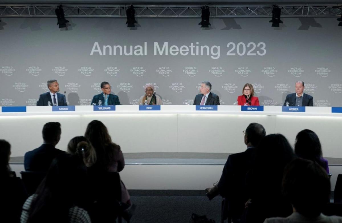 Merck Annual Meeting photo of people at a conference table