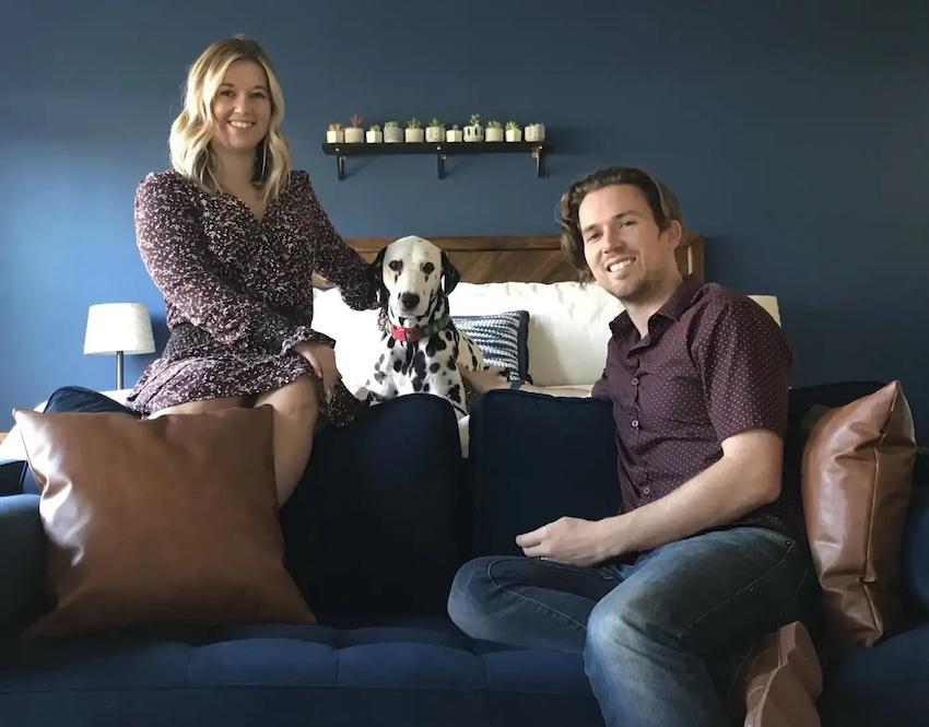 Erik Battista with his wife and dog, Zeppelin.