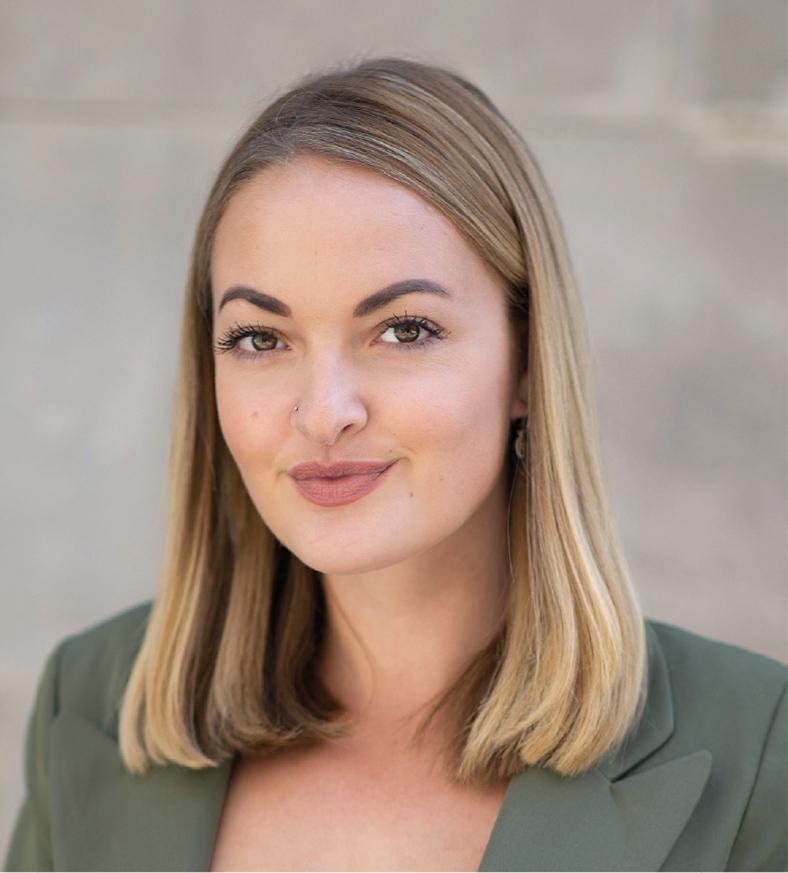 Profile picture of woman in light green blazer, Grace Coleman