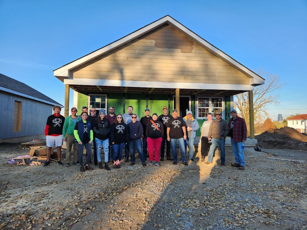 Wesco employee volunteers at one of 100 planned Habitat for Humanity in celebration of Wesco's 100th anniversary.