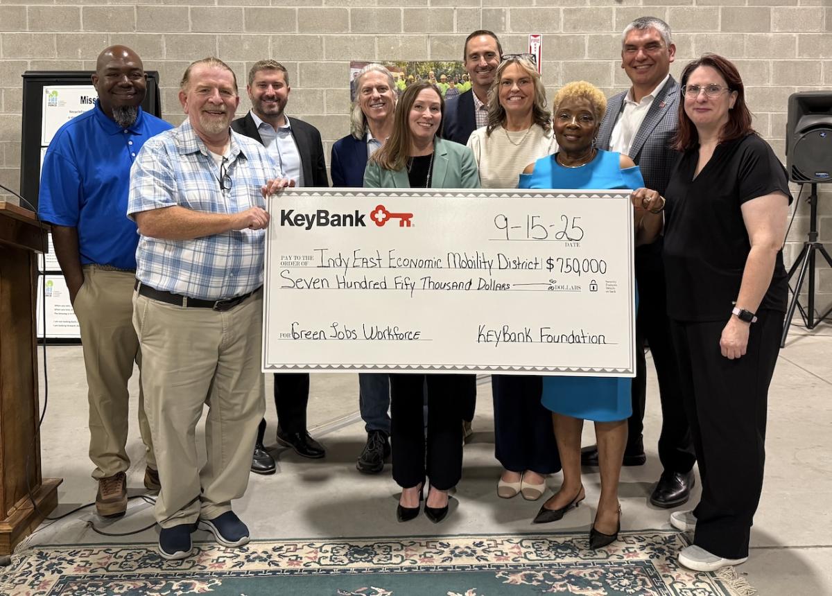 Representatives from KeyBank and IndyEast shown with a $750,000 grant check.