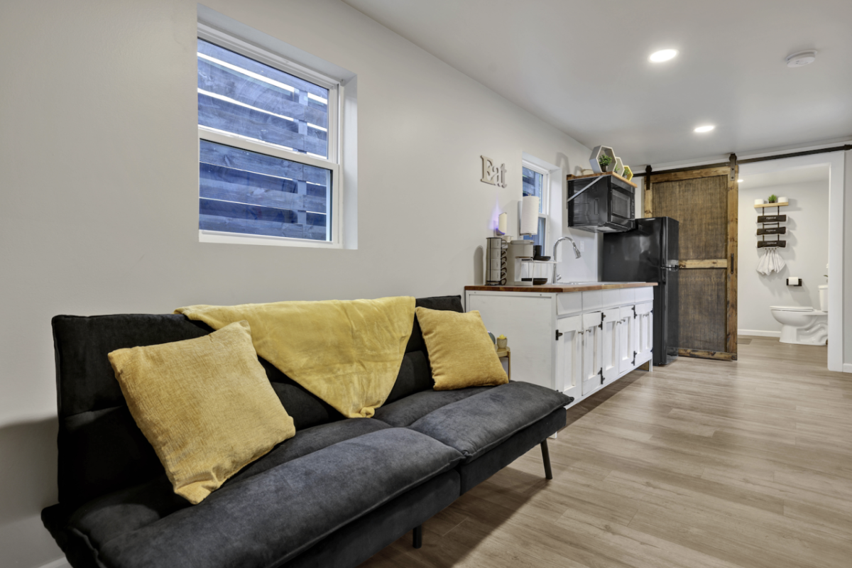 Interior of up-cycled shipping container rental at ekō Outpost properties