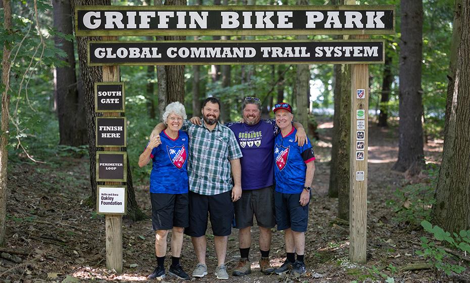 The Griffin family at the trailhead to Griffin Bike Park