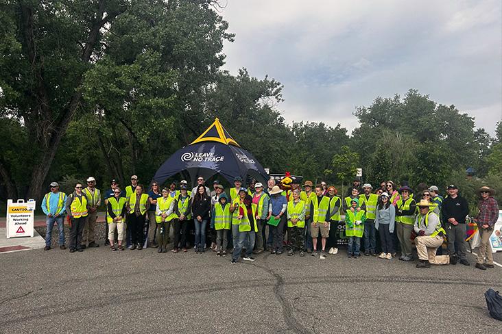 A large group of people wearing hi-vis vests 