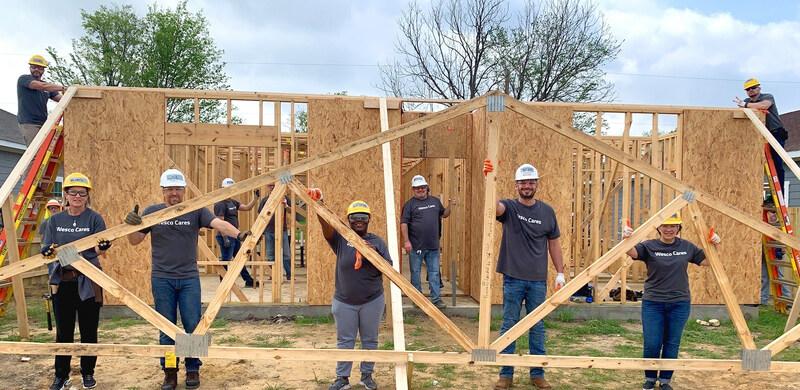 Group building a house