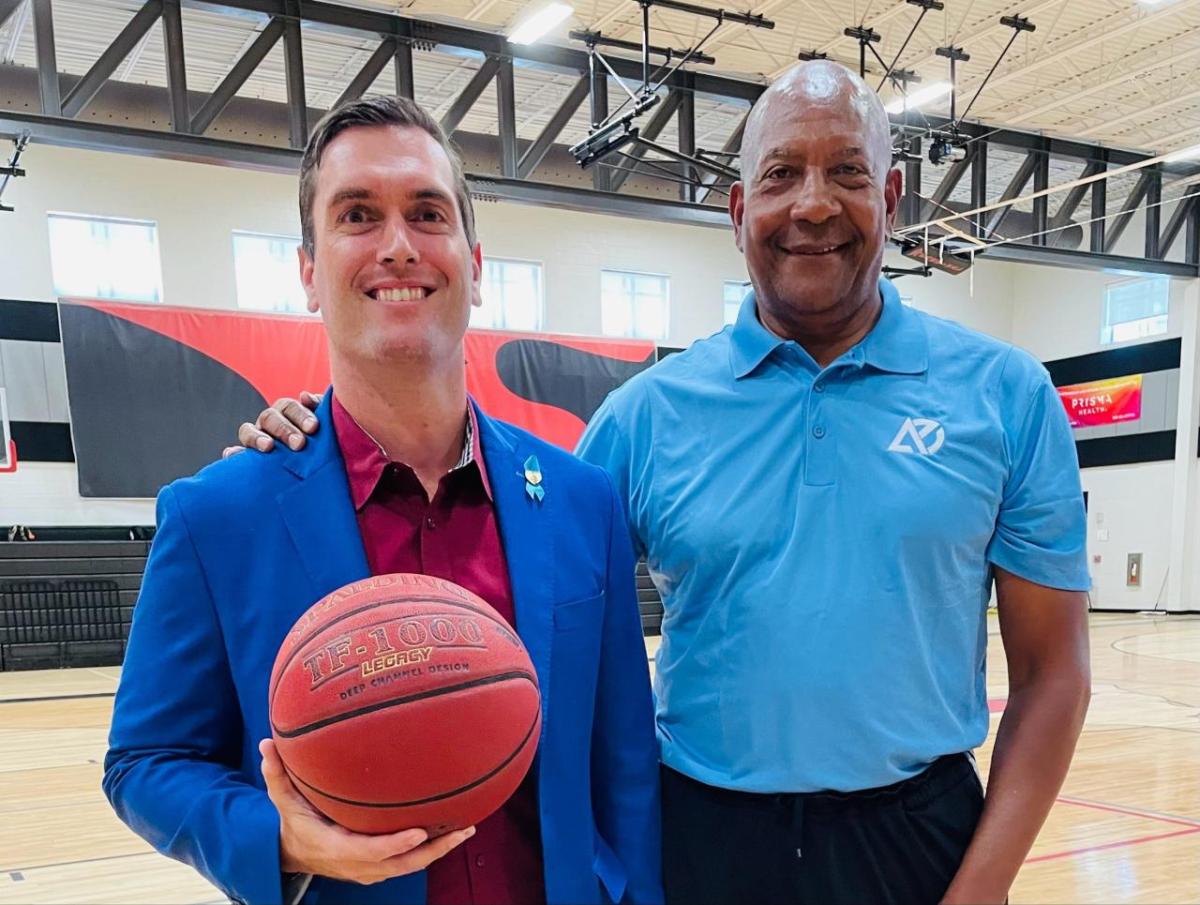 Bob Ruff (left) and Alex English (right) at the 2024 Alex English Basketball Camp. " "