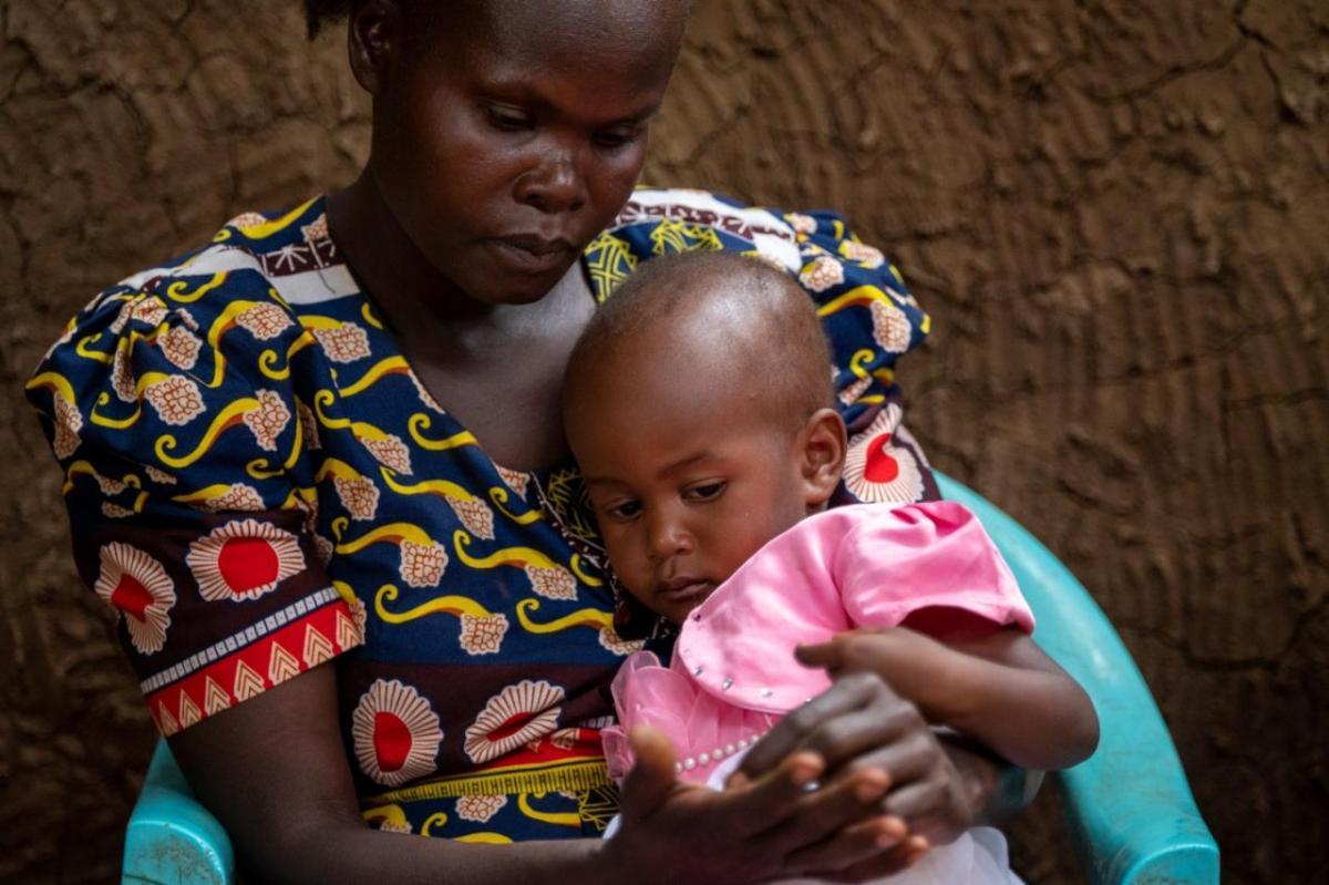 Promoting Health Equity for Underserved Communities. This woman and her child belong to a family impacted by albinism and are supported by Golden Aged And Albinism Support And Protection Programme, an NGO Boehringer collaborates with in Kenya. " "