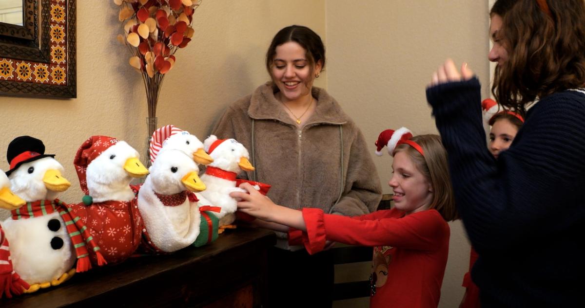 Family shown with the Aflac Duck. 