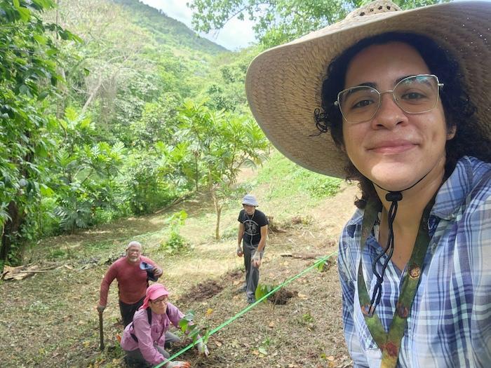 Coral Gonzalez shown with her garden.