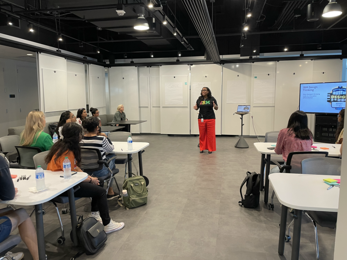 teacher in front of a modern classroom