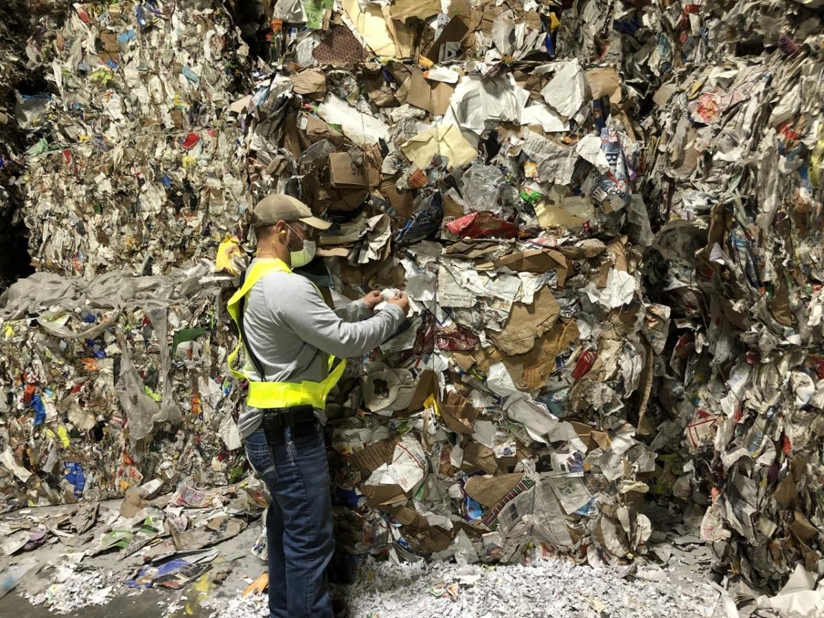 Technician Jamie Borden surveys some of the recycled materials that come into the Essity plant in Barton, AL.