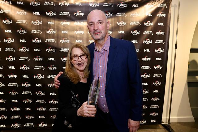 Carol Cone (left) and Steve Barrett (right), Editorial Director, PRWeek. Carol Cone receiving award.