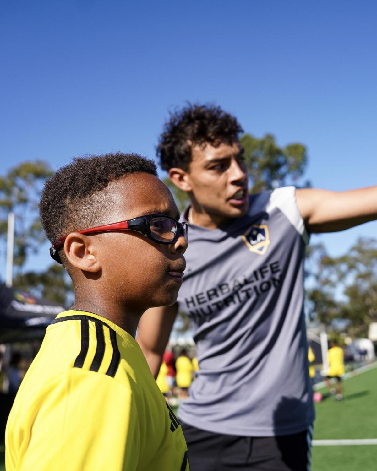Athletes from the United LA Girls Soccer Team joined Galaxy coaches in leading drills and engaging with the young players.