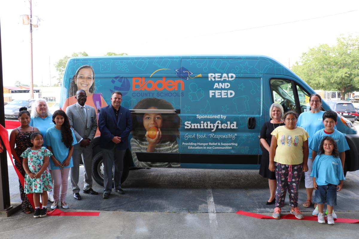 Smithfield Foods unveils a mobile feeding unit for the Bladen County Schools “Read and Feed” program giving more than 4,000 students throughout Bladen County, North Carolina access to free meals and literacy programs this summer.