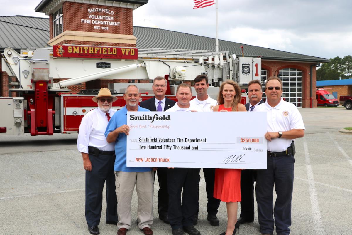 Smithfield Foods presented the Smithfield Volunteer Fire Department with $250,000 to aid in the purchase of a new and improved ladder truck for use throughout Isle of Wight County.