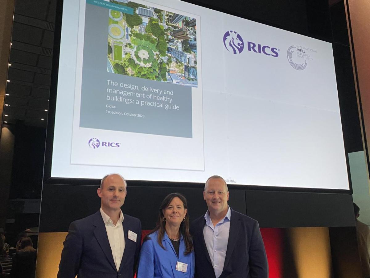 IWBI’s Rick Le Sueur (left) and Ann Marie Aguilar (centre) are joined by RICS’ Paul Bagust (right) at the WELL Regional Summit in London on October 10th. " "