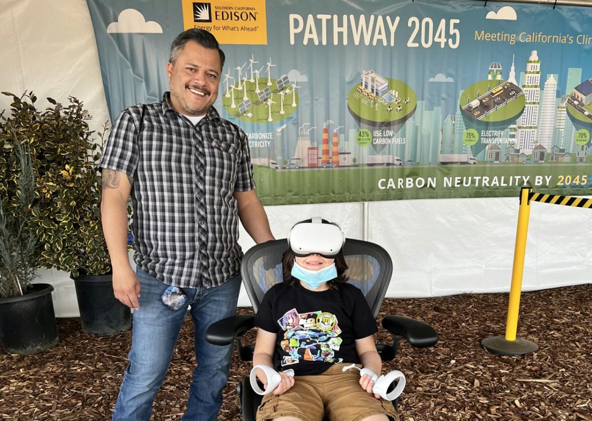 parent with a child wearing VR headset
