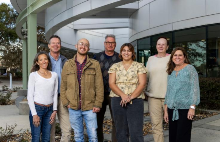 From left to right: Dr. Jennifer Johnston, CEO and co-founder; Michael Hanley, board member and co-founder; Cole Hautamaki, technician; Dr. Ron Mandel, professor at the University of Florida and consultant to NysnoBio; Victoria Rodriguez, technician; Dr. Elizabeth Higgins, chief technical officer; Amy Poirier, director of pre-clinical lab operations. 